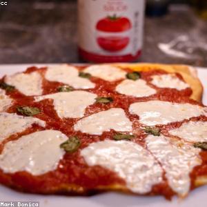 Logo Pizzaria Bella